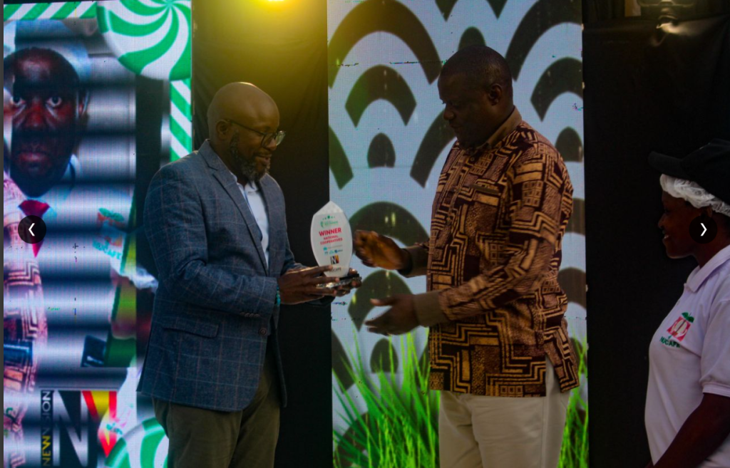 NUCAFE receiving the Uganda Best Farmers Award 2024, National Cooperatives category